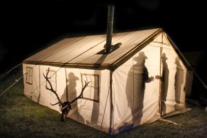 hunters in canvas tent
